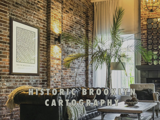 Framed 1880 South Williamsburg vintage map displayed as oversized wall art in a modern loft, showcasing digitally restored cartography details, archival pigment ink clarity, and fine-art cotton paper texture.